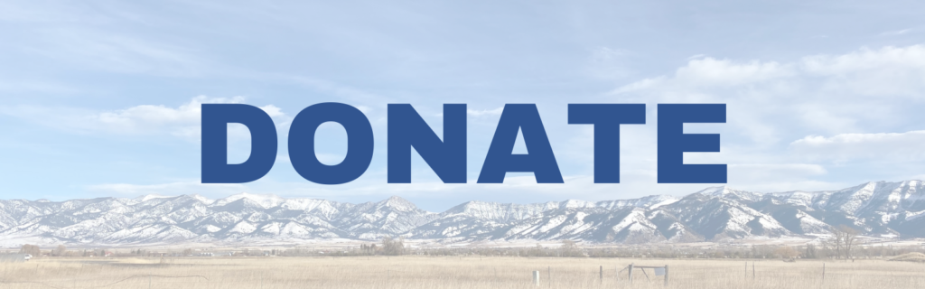Donate written over faded image of the Bridger Mountains during the winter, covered in snow.