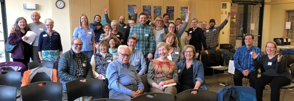 A photo of people smiling at the Gallatin County Democrats 2019 County Convention.